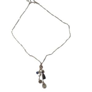 Elegant Silver Necklace with Charms